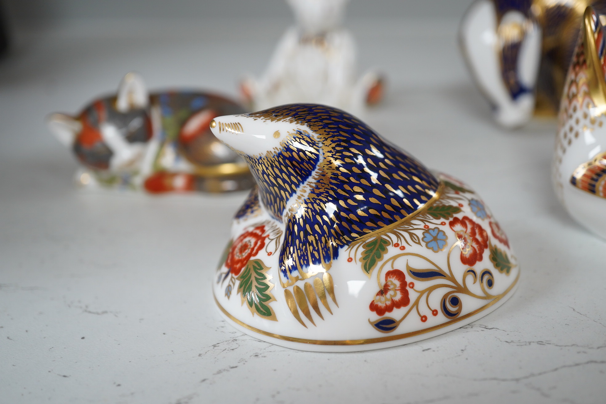 A collection of ten Royal Crown Derby animal paperweights, tallest pelican 13cm high. Condition - good